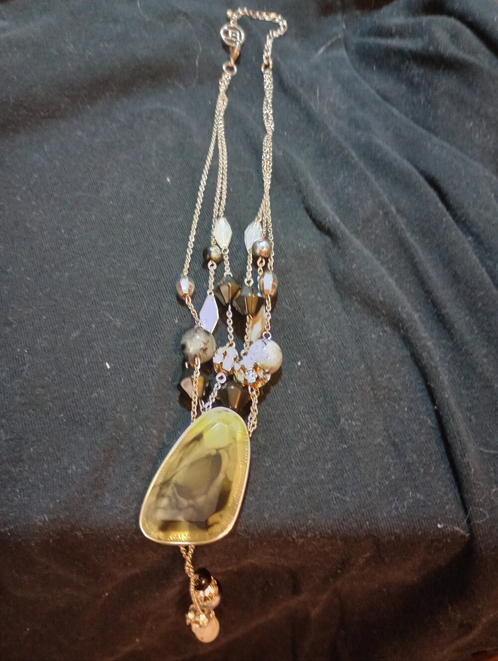 Multi-Strand Silver Necklace with Brown Under Tones Olive Green Stone Pendant